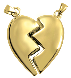 two halves of companion heart pendant forming whole heart