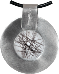 lock of hair style shown on back of pendant