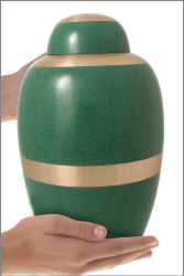 Teal and Brass Traditional Cremation Urn shown in hands for size scale
