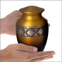 sunset sharing urn shown in hands for size relation