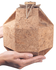 adagio biodegradable cork urn shown in hands for size scale