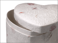 detail of lid opened of floral heart biodegradable urn