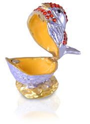 lavender bird shown with open compartment