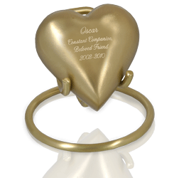 brass heart shown with gold stand