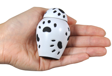 black and white pawprint keepsake shown in hand