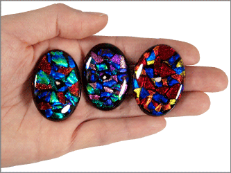 worry stones shown in hand for size scale